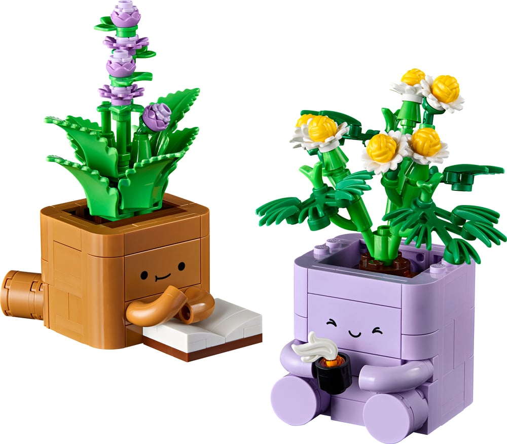 Deux plantes LEGO : un pot marron souriant qui lit un livre et un pot violet qui tient une tasse de thé